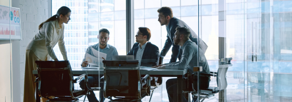 business team meeting in office, AI and compliance