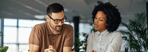 Leader talking with employee, use cases for generative ai in L&D