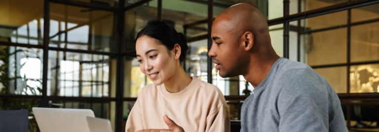 AI business mentor, two diverse employees discussing