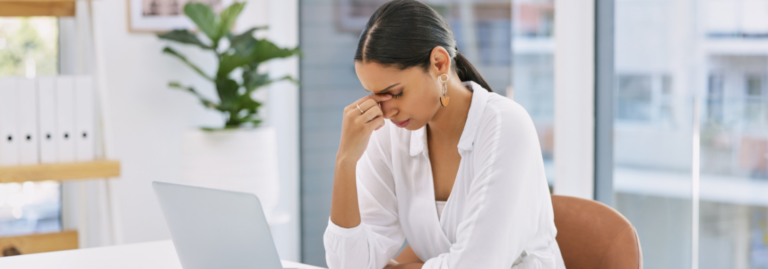 failing forward, frustrated woman at her desk