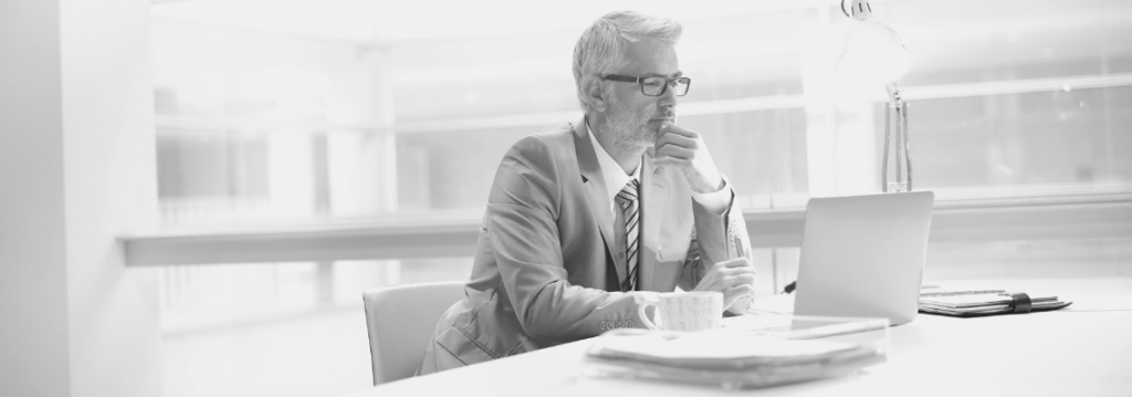 gray area thinking, businessman considering the options